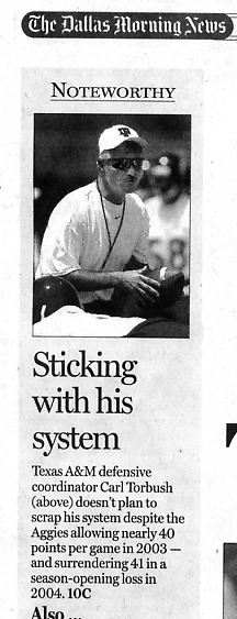 Image Credit:  Dallas Morning News September 15, 2004, Page 1C, article by Rachel Cohen.  Interesting quote from the article:  "The Aggies allowed 38.8 points.  Hindered by a dearth of depth and speed, they started a former walk-on at middle linebacker and relied heavily on under-classmen."  My question is:  what was the point in questioning the starting of the "former walk-on"?  Is starting a walk-on a bad thing?  Or was this particular player an under achiever?  Or was he an over achiever?  Or was it a bad coaching decision to play a walk-on at such an important positon.  But then again, which position is unimportant in the defense?
