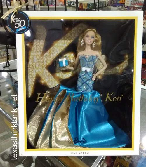 "What's in the box?" is the question which comes to mind upon seeing the special "Happy Birthday Ken" Barbie Doll, a member of the Barbie Pink Label collection, which celebrates the 50th Anniversery of Ken.
