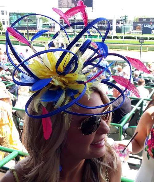 The fascinator on a beautiful blonde at Churchill Downs in Louisville, Kentucky on Thurby 2019.