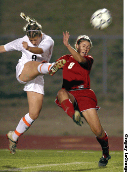 Photo Credit: Gregory LaGrange (see www.gregorylagrange.com), photo taken from one of the most hotly contested rivalries in all of sport: Grapevine Mustangs v. Colleyville Heritage Panthers, no doubt contested at the Mustang-Panther Stadium in Grapevine, TX.