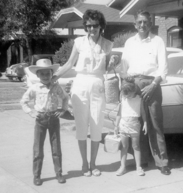 If memory serves, this is myself on the left with my family including Warner Marshall Kimbro and Edna Mae Kimbro and my sister Sharon Jane Kimbro, in front of our home at 2223 North 9th Street in Phoenix, Arizona.