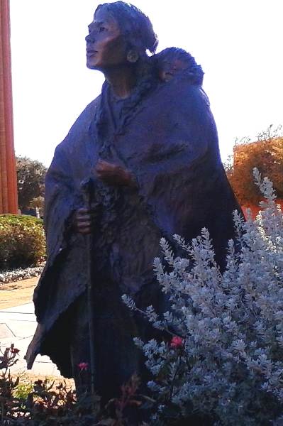 Photo of a statue of Lewis and Clark expedition member Sacagawea carrying her son Jean Baptiste Charbonneau on display at the National Cowgirl Museum in Fort Worth, TX.