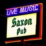 Neon sign above the Saxon Pub on Lamar Street in Austin, TX.  Live music is the main course of the fine club, as I've seen both Carolyn Wonderland and The Paula Nelson Band play there, on the same night.