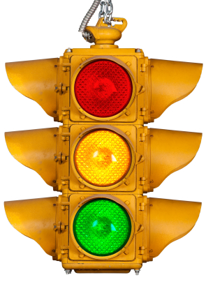Pic of a regular traffic light in the standard red, yellow, green configuration.