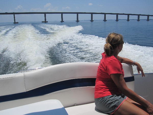 Mrs. Barbara Maxwell looking out over Choctawhatchee Bay to Destin's Mid-Bay Bridge.