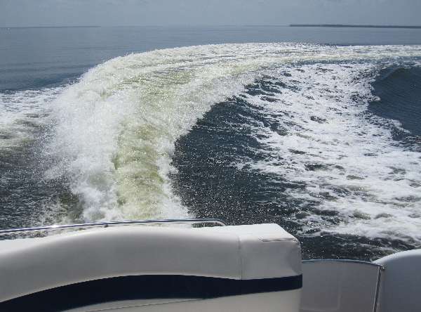 View of the wake while carving a turn on the intracoastal waterway North of Destin, Florida.