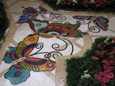 At the Encore and The Wynn Las Vegas Resorts you'll find a butterfly on the floor every 10 feet.  They are beautiful.
