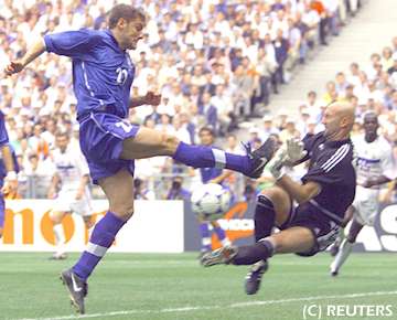 Mens Soccer Action-French Goalkeeper Fabian Barthez Saves a point blank shot in FIFA World Cup 98.