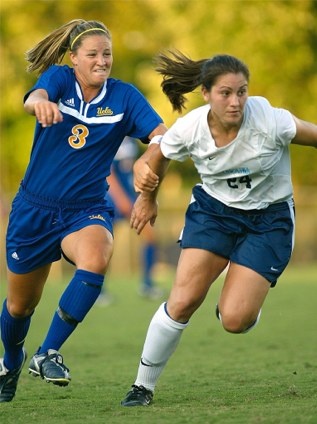 Photo "North Carolina's Jessica Maxwell v. UCLA's Kim Devine" in 2003 by Shane Lardinoi @ nc-soccer.com