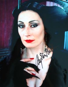 Anjelica Huston as Morticia Addams, portrays a classic handsome woman in all the films in which she stars, including The Royal Tenenbaums, The Grifters, and Blood Work.