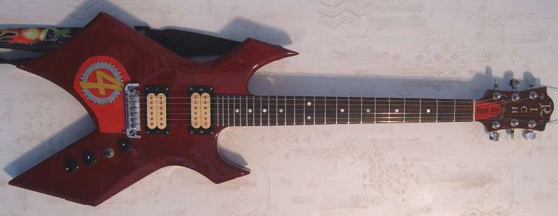 One sweet B. C. Rich NJ Series electric guitar of neck through construction with 24.75" scale length and 4-wire Dimarzio USA humbucker pickups and coil tap switch, featuring Real Ale Fireman's #4 art work added to hide damage to the guitar.