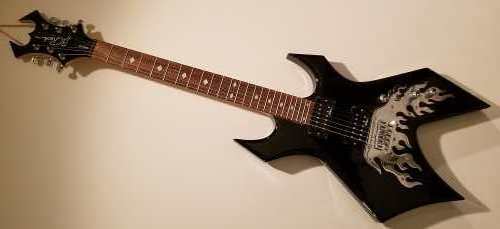 Basic black B.C. Rich Warlock Special Edition electric guitar with Afterburner Flames bidge treatment and BDSM humbucker pickups.  It has stylish diamond inlays and benefits from a 25.5" scale length.