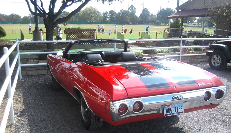Feast your eyes on this choice red Chevy Chevelle SS convertible which was parked in front of Bob Moore's Sports Center in Colleyville, TX, serving the Colleyville, Grapevine, Southlake, TX area.  It's Northeast Tarrant County's finest driving range.