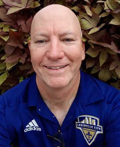 Mike Kimbro in a polo shirt promoting the local Kentucky favorites Louisville City FC.