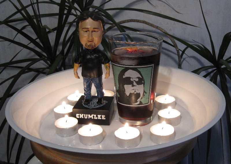 Behold, a shrine to The Chumlee of Pawn Stars, which includes my Chumlee bobblehead and a drinking glass with Chum's likeness with sunglasses.