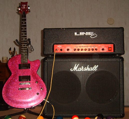 Mike Kimbro's Daisy Rock Rock Candy guitar in Atomic Pink with Line 6 Flextone HD solid state amp head.