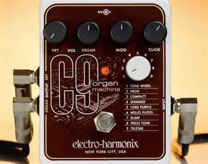 The Electro-Harmonix C9 organ machine shown with 1/4" cables attached as follows: input on the right, and on the left is the organ out jack as well as the separate output jack, which is probably a dry signal.