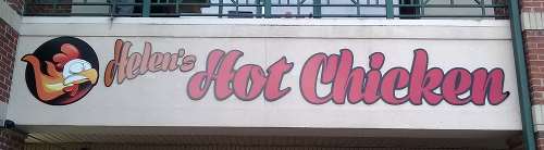 Nashville is famous for it's delicious hot fried chicken, such as that served by Helen's Hot Chicken.