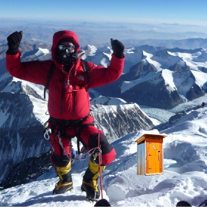 A doctored photo of Irish climber Dered Mahon on Mount Everest's summit with an outhouse photophopped into the pic by the author.