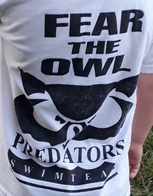 Photo of the T-Shirt of a member of the East Louisville Swimteam the Owl Creek Predators.