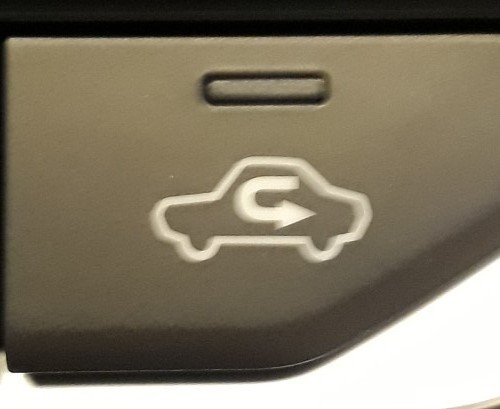 Photo title: Recirculation Button on the dash of a 2014 Nissan Altima sedan.