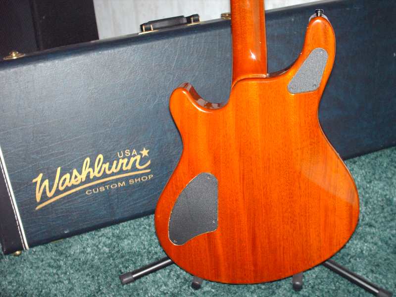 back of the Washburn WMS electric guitar with Washburn U.S.A. custom shop case