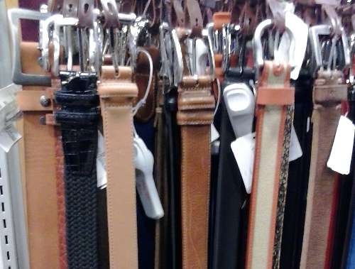 Various belts which match nicely with British tan mens shoes.  Photo taken at Neiman Marcus Last Call in Grapevine, TX.