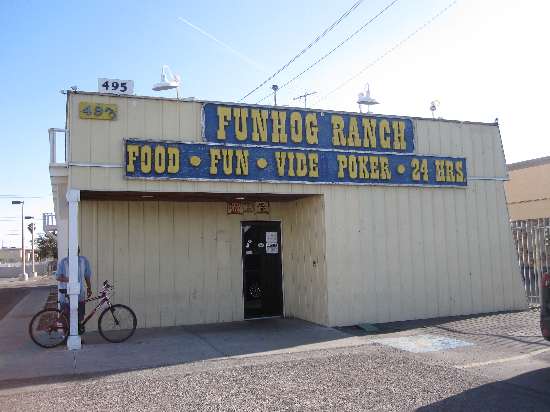 Las Vegas poetry takes an unexpected turn with this photo of the Fun Hog Ranch on Twain Ave, which, while reading the yelp reviews, is listed as both a dive bar and a gay bar.
