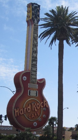A picture of the huge Les Paul guitar which sits in front of the Hard Rock Cafe on Paradise Road in Las Vegas.  Just behind it is the Hard Rock Hotel and Casino.