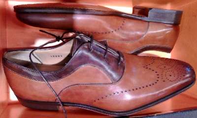 Sporting whole cut brogue treatments, and beautiful cognac with brown leather accents, here's a Magnanni style NMLC16693 from Neiman Marcus Last Call at Grapevine Mills Mall.