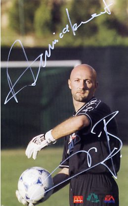 Behold, the autographed photo of Fabian Barthez which resides on the wall of my son's bedroom.